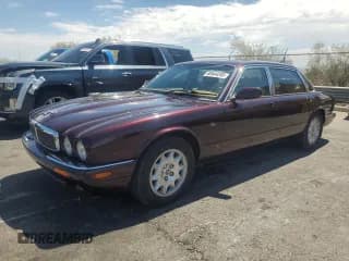 ✅ 2000 Jaguar XJ • VIN: SAJDA23C9YLF18784 • Lot: 69444205. Listed on Copart with 81,598 mi. Free auction sales archive from the USA and detailed vehicle history report at DreamBid. Image 1.
