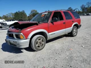 ✅ 1996 Chevrolet Blazer • VIN: 1GNDT13W9T2285134 • Lot: 86460795. Wystawiony na Copart z przebiegiem 262 482 mil. Bezpłatny archiwum sprzedaży aukcyjnych z USA i szczegółowy raport historii pojazdu na DreamBid. Zdjęcie 1.