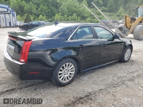 ✅ 2012 Cadillac CTS • VIN: 1G6DC5E50C0122911 • Lot: 56625855. Listed on Copart with 113,600 mi. Free auction sales archive from the USA and detailed vehicle history report at DreamBid. Image 3.