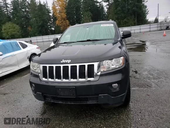 ✅ 2011 Jeep Grand Cherokee Laredo • VIN: 1J4RR4GG9BC705592 • Lot: 93147795. Listed on Copart with 221,481 mi. Free auction sales archive from the USA and detailed vehicle history report at DreamBid. Image 14.