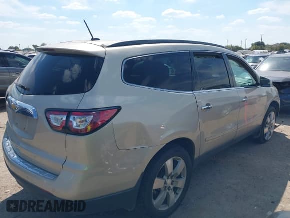 ✅ 2014 Chevrolet Traverse LTZ • VIN: 1GNKRJKD1EJ186998 • Lot: 43325043. Listed on IAAI with 178,322 mi. Free auction sales archive from the USA and detailed vehicle history report at DreamBid. Image 13.