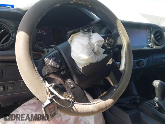 ✅ 2021 Toyota Tacoma SR • VIN: 3TYAX5GN1MT032297 • Lot: 42712393. Listed on IAAI with 58,825 mi. Free auction sales archive from the USA and detailed vehicle history report at DreamBid. Image 11.