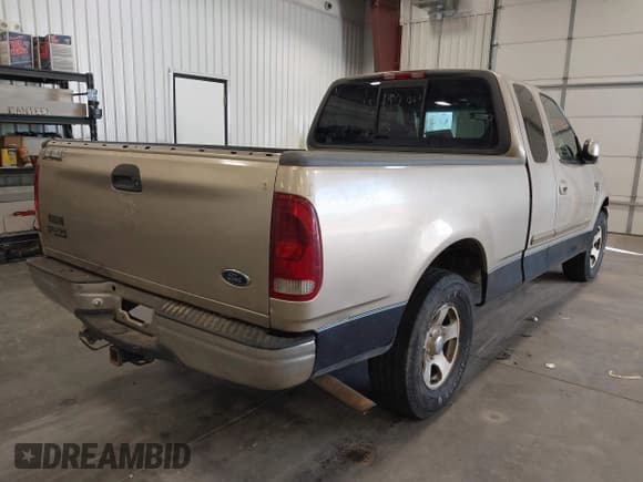 ✅ 2000 Ford F-150 XL • VIN: 1FTRX17W4YNB67723 • Lot: 43887880. Listed on IAAI with 193,537 mi. Free auction sales archive from the USA and detailed vehicle history report at DreamBid. Image 4.