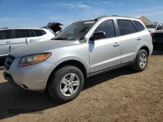 2009 Hyundai Santa Fe GLS z VIN 5NMSG73D19H230882, wystawiony jako Copart lot #71614155 z przebiegiem 118 381 mil mil oraz Szkoda całkowita • Salvage title. Historia ofert i sprzedaży dostępna na DreamBid. Obrazek 1.