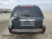 ✅ 2010 Mercury Mountaineer Premier • VIN: 4M2EN4JE8AUJ07231 • Lot: 77492094. Wystawiony na Copart z przebiegiem 130 841 mil. Bezpłatny archiwum sprzedaży aukcyjnych z USA i szczegółowy raport historii pojazdu na DreamBid. Zdjęcie 6.