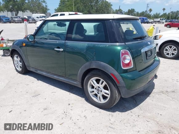 ✅ 2011 MINI Hardtop • VIN: WMWSU3C57BT093085 • Lot: 42492893. Listed on IAAI with 119,576 mi. Free auction sales archive from the USA and detailed vehicle history report at DreamBid. Image 3.