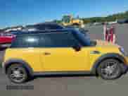 2007 MINI Hardtop S with VIN WMWMF73587TL90450, listed as a IAAI auction lot 43464250 with 36,615 mi miles and . Bid and sale history available at DreamBid. Image 13.