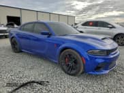 ✅ 2022 Dodge Charger SRT Hellcat Widebody • VIN: 2C3CDXL91NH135872 • Лот: 93831795. Опубликован ранее на Copart с пробегом 49 998 миль. Бесплатный доступ к архиву аукционных продаж из США и подробный отчёт об истории автомобиля на DreamBid. Изображение 4.