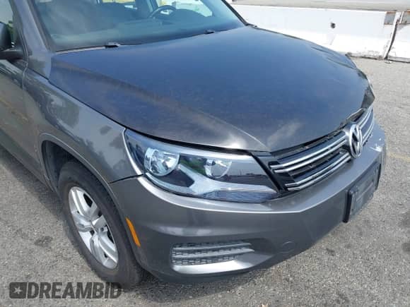 2013 Volkswagen Tiguan SE z VIN WVGAV7AX3DW020767, wystawiony jako IAAI lot #42433752 z przebiegiem 107 913 mil mil oraz . Historia ofert i sprzedaży dostępna na DreamBid. Obrazek 17.