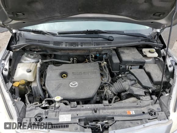 ✅ 2015 Mazda 5 Sport • VIN: JM1CW2BL2F0179147 • Lot: 54125515. Listed on Copart with 94,294 mi. Free auction sales archive from the USA and detailed vehicle history report at DreamBid. Image 12.