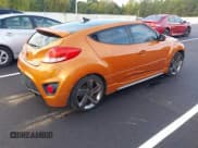 ✅ 2014 Hyundai Veloster Turbo • VIN: KMHTC6AE9EU208312 • Lot: 43273422. Listed on IAAI with 102,780 mi. Free auction sales archive from the USA and detailed vehicle history report at DreamBid. Image 4.