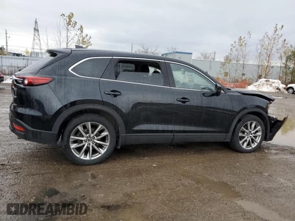 ✅ 2019 Mazda CX-9 Touring • VIN: JM3TCBCYXK0336413 • Лот: 92332225. Опубликован ранее на Copart с пробегом 90 067 миль. Бесплатный доступ к архиву аукционных продаж из США и подробный отчёт об истории автомобиля на DreamBid. Изображение 3.