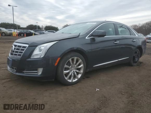 ✅ 2015 Cadillac XTS Luxury • VIN: 2G61N5S37F9222045 • Lot: 51443925. Wystawiony na Copart z przebiegiem 111 359 mil. Bezpłatny archiwum sprzedaży aukcyjnych z USA i szczegółowy raport historii pojazdu na DreamBid. Zdjęcie 1.