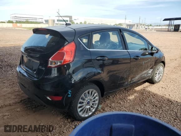 ✅ 2016 Ford Fiesta Titanium • VIN: 3FADP4FJ7GM138278 • Lot: 70993025. Wystawiony na Copart z przebiegiem 112 169 mil. Bezpłatny archiwum sprzedaży aukcyjnych z USA i szczegółowy raport historii pojazdu na DreamBid. Zdjęcie 3.
