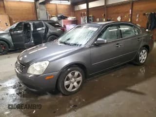 ✅ 2008 Kia Optima LX • VIN: KNAGE123485257378 • Лот: 77152824. Опубликован ранее на Copart с пробегом 96 049 миль. Бесплатный доступ к архиву аукционных продаж из США и подробный отчёт об истории автомобиля на DreamBid. Изображение 1.