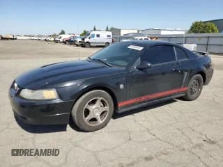 ✅ 2004 Ford Mustang Standard • VIN: 1FAFP40604F229014 • Lot: 82362445. Listed on Copart with 80,418 mi. Free auction sales archive from the USA and detailed vehicle history report at DreamBid. Image 1.