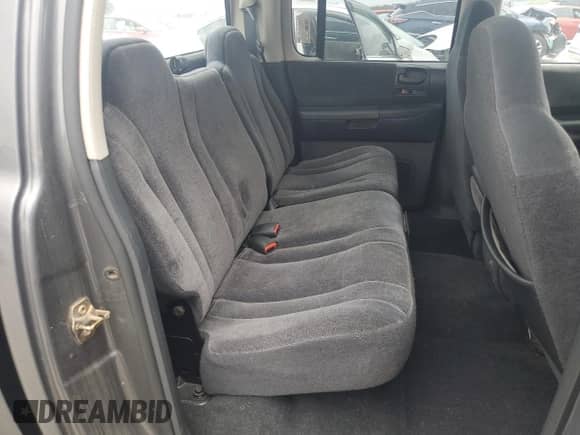 2003 Dodge Dakota SLT z VIN 1D7HL48N93S225937, wystawiony jako Copart lot #72817914 z przebiegiem 168 204 mil mil oraz Czysty tytuł • Clean title. Historia ofert i sprzedaży dostępna na DreamBid. Obrazek 10.