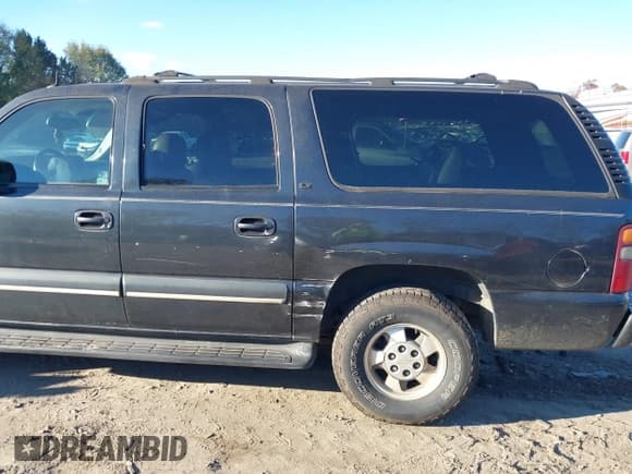 ✅ 2003 Chevrolet Suburban LT • VIN: 1GNEC16Z23J159956 • Lot: 40920994. Listed on IAAI with 255,603 mi. Free auction sales archive from the USA and detailed vehicle history report at DreamBid. Image 12.