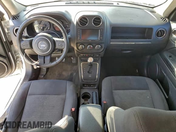 ✅ 2016 Jeep Patriot Latitude • VIN: 1C4NJPFB7GD562694 • Lot: 94829655. Listed on Copart with 71,476 mi. Free auction sales archive from the USA and detailed vehicle history report at DreamBid. Image 8.