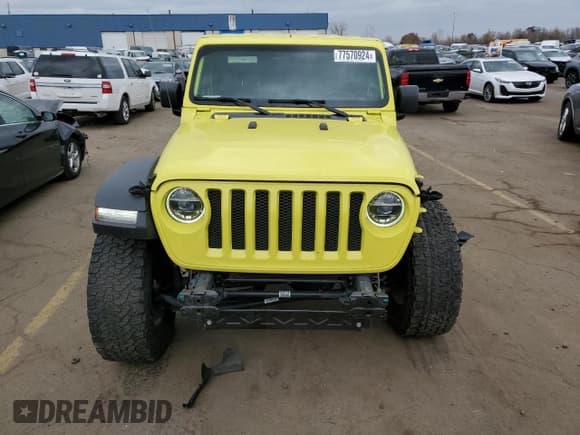 ✅ 2022 Jeep Wrangler Unlimited High Tide • VIN: 1C4HJXDG0NW204141 • Lot: 77570924. Listed on Copart with 58,114 mi. Free auction sales archive from the USA and detailed vehicle history report at DreamBid. Image 5.