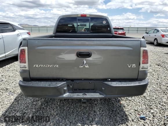 ✅ 2006 Mitsubishi Raider Duro Cross • VIN: 1Z7HC38N86S542959 • Lot: 57301385. Listed on Copart with 149,167 mi. Free auction sales archive from the USA and detailed vehicle history report at DreamBid. Image 6.
