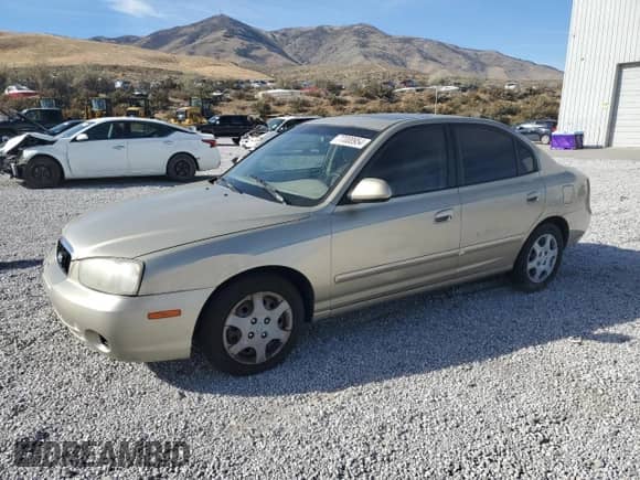 2002 Hyundai Elantra GLS z VIN KMHDN45D22U371819, wystawiony jako Copart lot #77000954 z przebiegiem 177 202 mil mil oraz Szkoda całkowita • Salvage title. Historia ofert i sprzedaży dostępna na DreamBid. Obrazek 1.