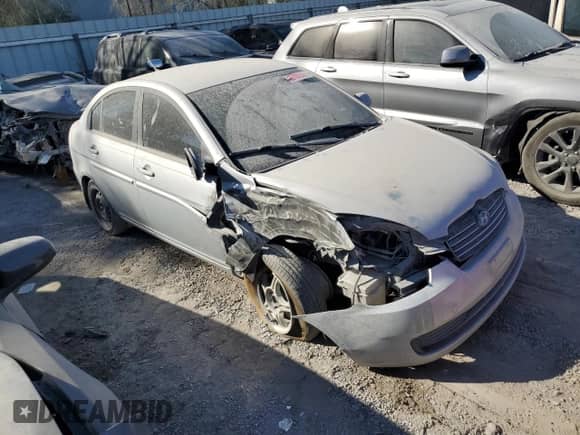 2007 Hyundai Accent GLS z VIN KMHCN46CX7U102105, wystawiony jako Copart lot #65793504 z przebiegiem 213 972 mil mil oraz Szkoda całkowita • Salvage title. Historia ofert i sprzedaży dostępna na DreamBid. Obrazek 4.