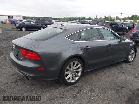 ✅ 2014 Audi A7 Prestige • VIN: WAU2GAFC5EN066739 • Лот: 42885046. Опубликован ранее на IAAI с пробегом 115 417 миль. Бесплатный доступ к архиву аукционных продаж из США и подробный отчёт об истории автомобиля на DreamBid. Изображение 4.