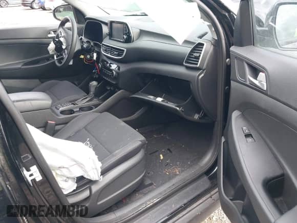 2019 Hyundai Tucson SE z VIN KM8J2CA47KU883670, wystawiony jako IAAI lot #43503613 z przebiegiem 51 899 mil mil oraz . Historia ofert i sprzedaży dostępna na DreamBid. Obrazek 5.