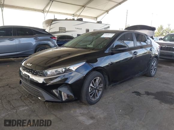 ✅ 2023 Kia Forte LXS • VIN: 3KPF24AD8PE607486 • Lot: 43666572. Listed on IAAI with 31,311 mi. Free auction sales archive from the USA and detailed vehicle history report at DreamBid. Image 2.