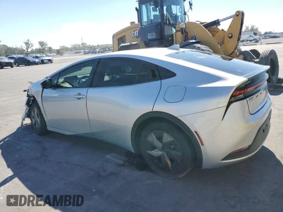 ✅ 2024 Toyota Prius LE • VIN: JTDACAAUXR3046093 • Lot: 90372365. Wystawiony na Copart z przebiegiem 15 281 mil. Bezpłatny archiwum sprzedaży aukcyjnych z USA i szczegółowy raport historii pojazdu na DreamBid. Zdjęcie 2.