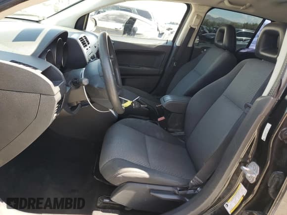 ✅ 2009 Dodge Caliber SXT • VIN: 1B3HB48A29D103266 • Лот: 68567414. Опубликован ранее на Copart с пробегом 98 633 миль. Бесплатный доступ к архиву аукционных продаж из США и подробный отчёт об истории автомобиля на DreamBid. Изображение 7.