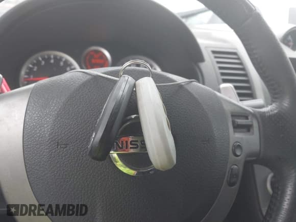 ✅ 2012 Nissan Sentra SE-R • VIN: 3N1BB6AP2CL642182 • Лот: 42191738. Опубликован ранее на IAAI с пробегом 92 858 миль. Бесплатный доступ к архиву аукционных продаж из США и подробный отчёт об истории автомобиля на DreamBid. Изображение 11.