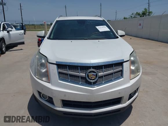 ✅ 2011 Cadillac SRX Performance Collection • VIN: 3GYFNBEY7BS585753 • Лот: 42278246. Опубликован ранее на IAAI с пробегом 233 329 миль. Бесплатный доступ к архиву аукционных продаж из США и подробный отчёт об истории автомобиля на DreamBid. Изображение 6.