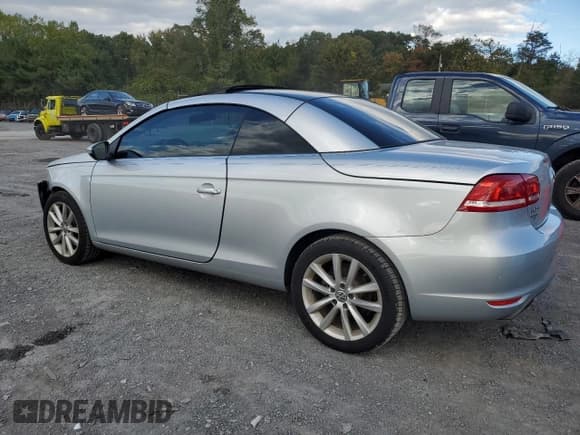 ✅ 2015 Volkswagen Eos Komfort • VIN: WVWBW8AH5FV003269 • Lot: 85868085. Wystawiony na Copart z przebiegiem 53 729 mil. Bezpłatny archiwum sprzedaży aukcyjnych z USA i szczegółowy raport historii pojazdu na DreamBid. Zdjęcie 2.
