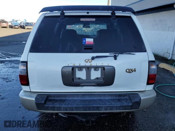 ✅ 2000 Infiniti QX4 • VIN: JNRAR07Y3YW084474 • Лот: 87089994. Опубликован ранее на Copart с пробегом 237 974 миль. Бесплатный доступ к архиву аукционных продаж из США и подробный отчёт об истории автомобиля на DreamBid. Изображение 6.