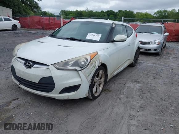 ✅ 2013 Hyundai Veloster w/Black Int • VIN: KMHTC6AD9DU155259 • Lot: 42361365. Listed on IAAI with 261,896 mi. Free auction sales archive from the USA and detailed vehicle history report at DreamBid. Image 2.