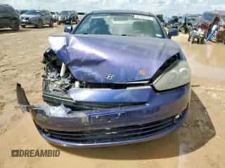 2007 Hyundai Tiburon GS с VIN KMHHM66D87U256521, выставлен на аукционе Copart как лот 62356725 с пробегом 80 920 миль миль и Чистый • Clean title. История ставок и продаж доступна на DreamBid. Изображение 5.