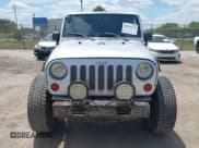 ✅ 2009 Jeep Wrangler X • VIN: 1J4FA24189L755392 • Lot: 42811063. Listed on IAAI with 97,644 mi. Free auction sales archive from the USA and detailed vehicle history report at DreamBid. Image 6.