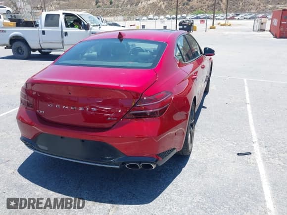 ✅ 2023 Genesis G70 2.0T • VIN: KMTG34TA2PU120811 • Lot: 42606414. Listed on IAAI with 11,731 mi. Free auction sales archive from the USA and detailed vehicle history report at DreamBid. Image 4.