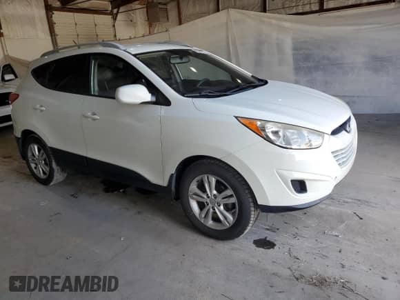 2011 Hyundai Tucson GLS z VIN KM8JU3AC0BU128555, wystawiony jako Copart lot #86261275 z przebiegiem 177 820 mil mil oraz Szkoda całkowita • Salvage title. Historia ofert i sprzedaży dostępna na DreamBid. Obrazek 4.