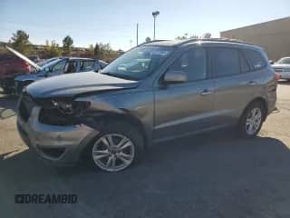 2012 Hyundai Santa Fe Limited с VIN 5XYZK4AG5CG167182, выставлен на аукционе Copart как лот 82713395 с пробегом 103 303 миль миль и Чистый • Clean title. История ставок и продаж доступна на DreamBid. Изображение 1.