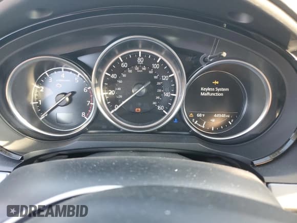 ✅ 2020 Mazda CX-9 Touring • VIN: JM3TCACYXL0401997 • Lot: 86842655. Wystawiony na Copart z przebiegiem 44 948 mil. Bezpłatny archiwum sprzedaży aukcyjnych z USA i szczegółowy raport historii pojazdu na DreamBid. Zdjęcie 9.