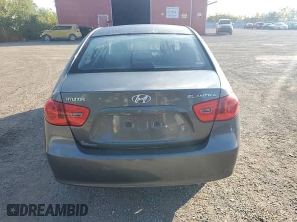2009 Hyundai Elantra GLS z VIN KMHDU45D49U588608, wystawiony jako Copart lot #72958564 z przebiegiem 102 406 mil mil oraz Czysty tytuł • Clean title. Historia ofert i sprzedaży dostępna na DreamBid. Obrazek 6.
