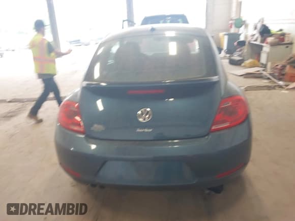 ✅ 2016 Volkswagen Beetle Wolfsburg Edition • VIN: 3VWF17AT8GM633911 • Lot: 42267243. Listed on IAAI with 73,811 mi. Free auction sales archive from the USA and detailed vehicle history report at DreamBid. Image 16.