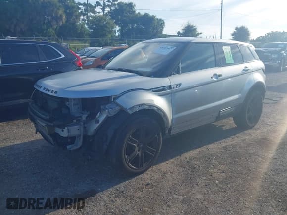 ✅ 2013 Land Rover Range Rover Evoque Pure • VIN: SALVN2BG7DH732185 • Лот: 43107507. Опубликован ранее на IAAI с пробегом 82 730 миль. Бесплатный доступ к архиву аукционных продаж из США и подробный отчёт об истории автомобиля на DreamBid. Изображение 2.