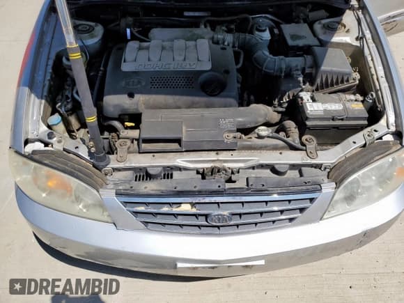 ✅ 2002 Kia Spectra • VIN: KNAFB121225139436 • Лот: 71047615. Опубликован ранее на Copart с пробегом 128 223 миль. Бесплатный доступ к архиву аукционных продаж из США и подробный отчёт об истории автомобиля на DreamBid. Изображение 11.