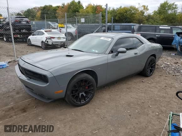 2009 Dodge Challenger SE z VIN 2B3LJ44V49H542302, wystawiony jako Copart lot #71263994 z przebiegiem 158 718 mil mil oraz Szkoda całkowita • Salvage title. Historia ofert i sprzedaży dostępna na DreamBid. Obrazek 1.
