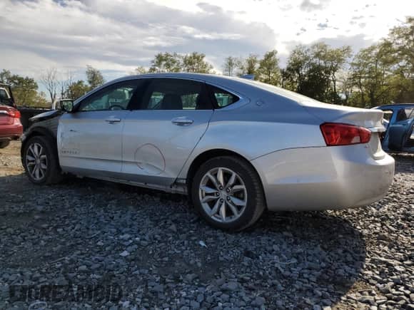 2017 Chevrolet Impala LT with VIN 1G1105S33HU192522, listed as a Copart auction lot 82408215 with 96,024 mi miles and Salvage title. Bid and sale history available at DreamBid. Image 2.