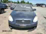 2009 Hyundai Accent Auto GLS z VIN KMHCN46C69U349995, wystawiony jako Copart lot #61442814 z przebiegiem 125 700 mil mil oraz Szkoda całkowita • Salvage title. Historia ofert i sprzedaży dostępna na DreamBid. Obrazek 5.